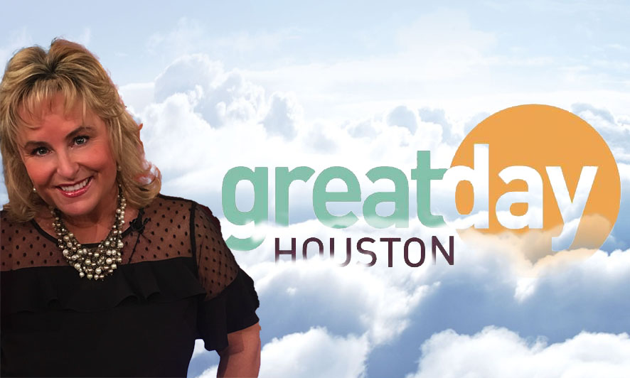 A woman smiling with a 'Great Day Houston' graphic and sky background.