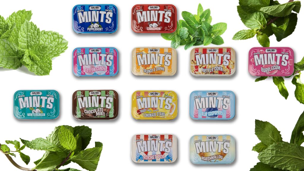 Various flavored Altoids mints in colorful tins arranged with fresh mint leaves.