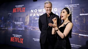 Two people engaged in conversation at a Netflix event.